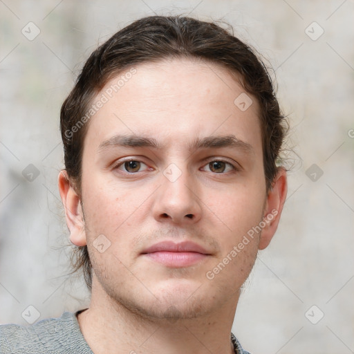 Neutral white young-adult male with short  brown hair and grey eyes