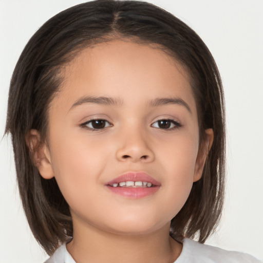 Joyful white child female with medium  brown hair and brown eyes