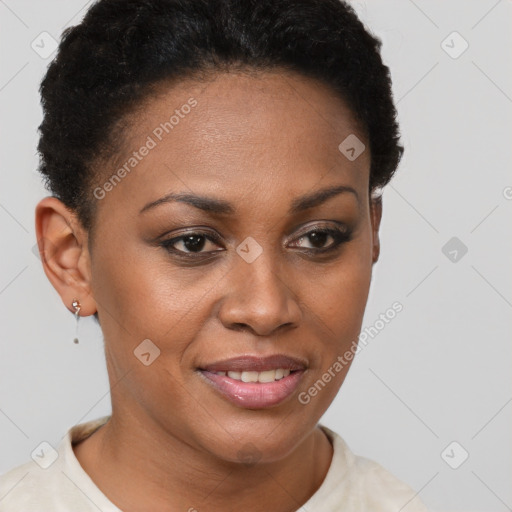 Joyful black young-adult female with short  brown hair and brown eyes