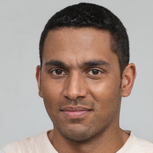 Neutral black adult male with short  black hair and brown eyes
