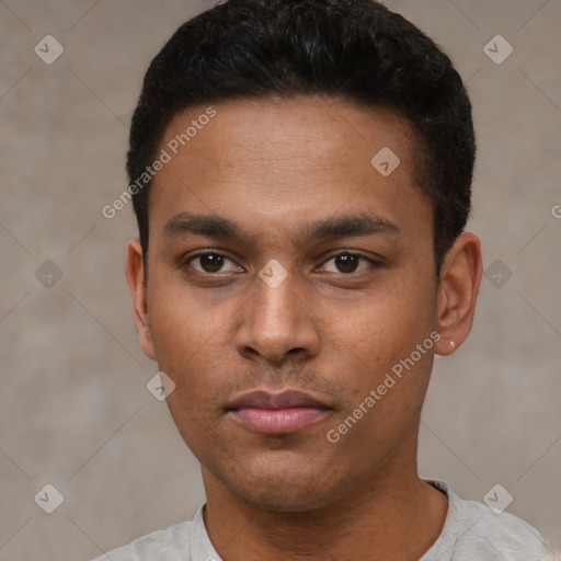 Neutral latino young-adult male with short  black hair and brown eyes