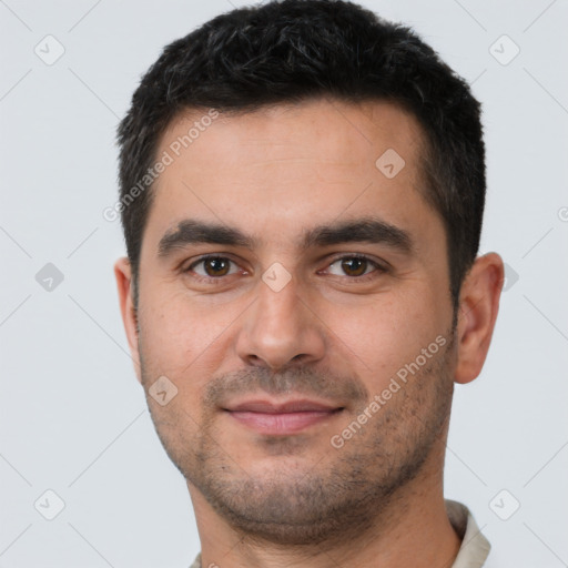 Neutral white young-adult male with short  black hair and brown eyes