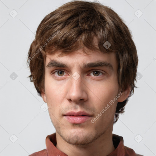 Neutral white young-adult male with short  brown hair and grey eyes