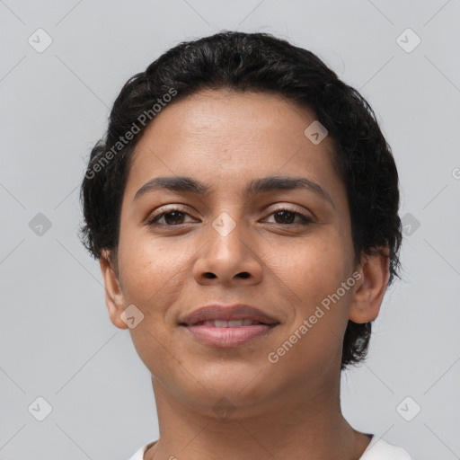 Joyful latino young-adult female with short  black hair and brown eyes