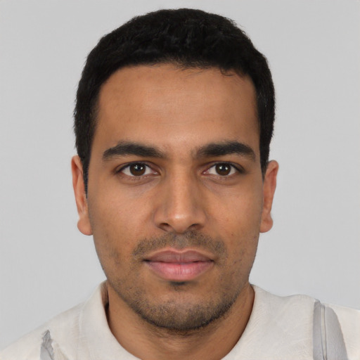 Neutral latino young-adult male with short  black hair and brown eyes