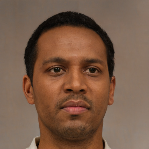 Neutral black young-adult male with short  brown hair and brown eyes