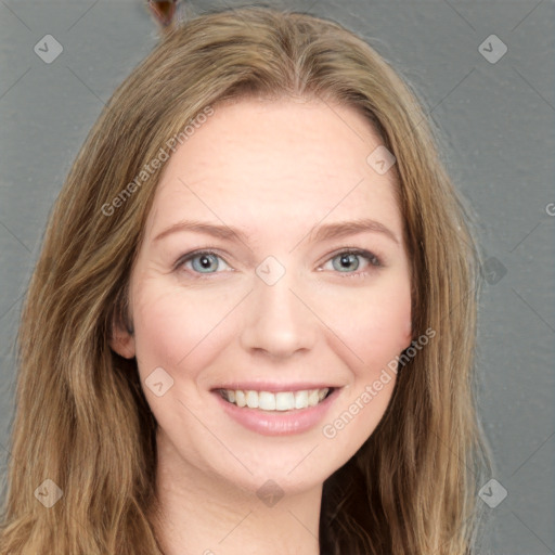 Joyful white young-adult female with long  brown hair and grey eyes