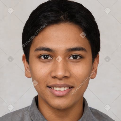 Joyful latino young-adult male with short  black hair and brown eyes