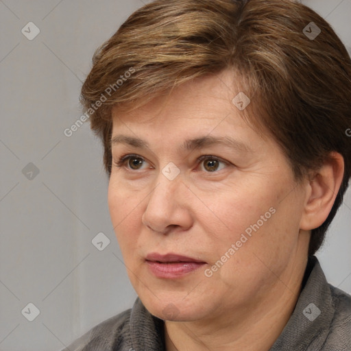 Joyful white adult female with short  brown hair and brown eyes