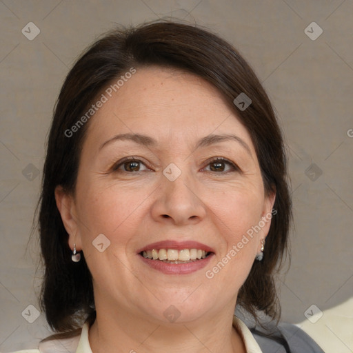 Joyful white adult female with medium  brown hair and brown eyes