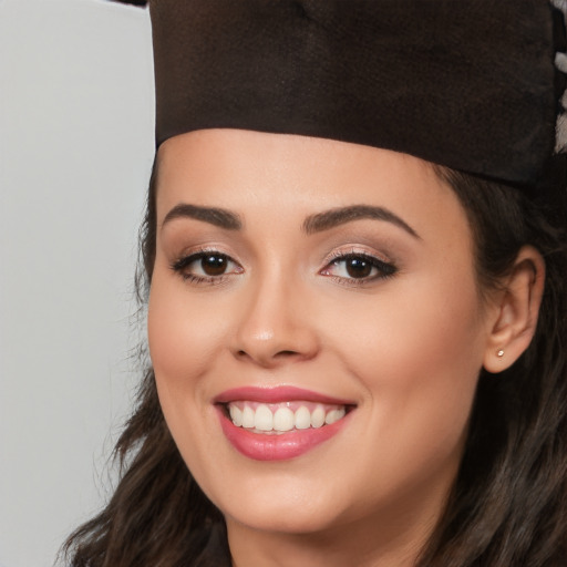 Joyful white young-adult female with long  black hair and brown eyes