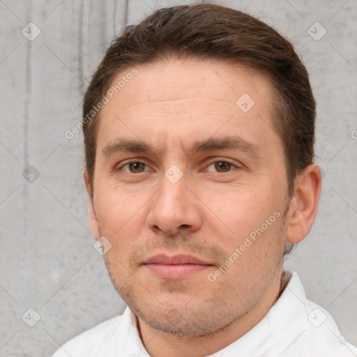 Joyful white adult male with short  brown hair and brown eyes