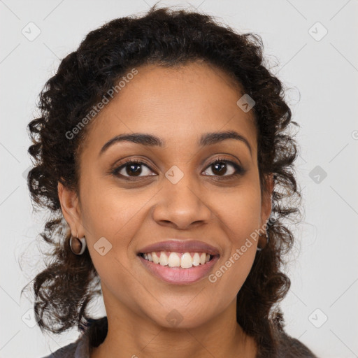 Joyful latino young-adult female with long  brown hair and brown eyes