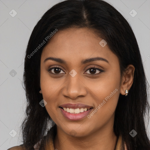 Joyful latino young-adult female with long  brown hair and brown eyes