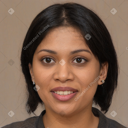 Joyful black young-adult female with medium  black hair and brown eyes