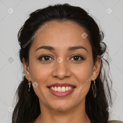 Joyful latino young-adult female with medium  brown hair and brown eyes