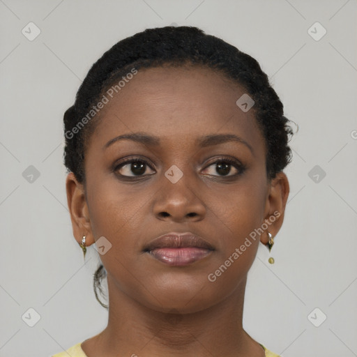 Neutral black young-adult female with short  brown hair and brown eyes