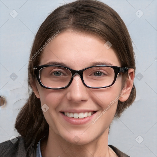 Joyful white young-adult female with medium  brown hair and grey eyes