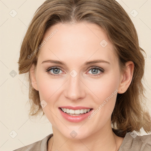 Joyful white young-adult female with medium  brown hair and green eyes