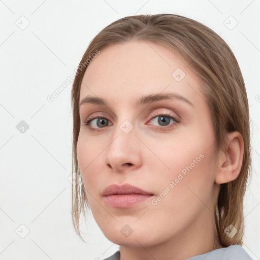 Neutral white young-adult female with long  brown hair and grey eyes