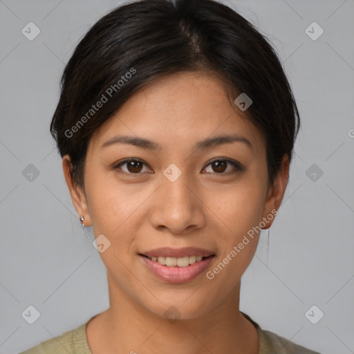 Joyful latino young-adult female with short  brown hair and brown eyes