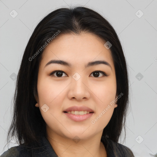 Joyful asian young-adult female with medium  black hair and brown eyes