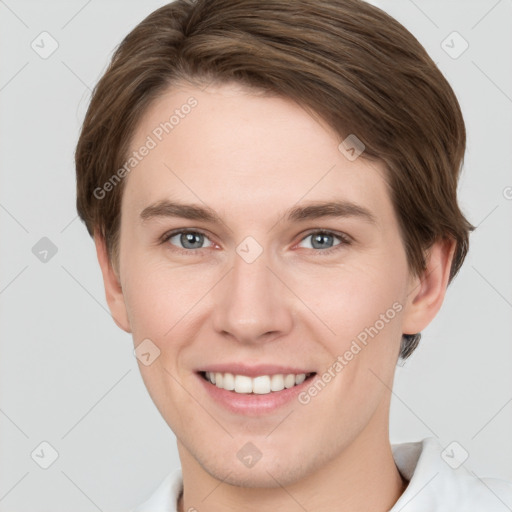 Joyful white young-adult female with short  brown hair and grey eyes