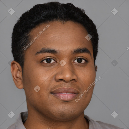 Joyful black young-adult male with short  brown hair and brown eyes