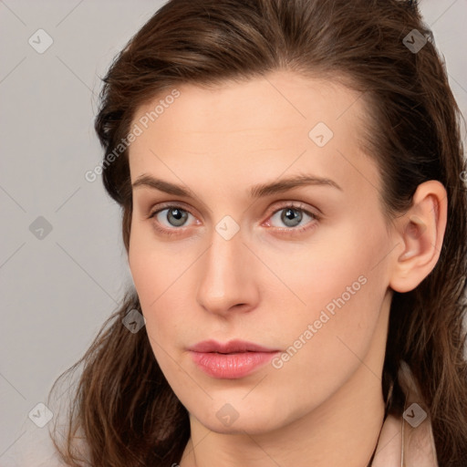 Neutral white young-adult female with long  brown hair and grey eyes