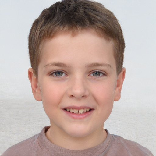 Joyful white child male with short  brown hair and brown eyes