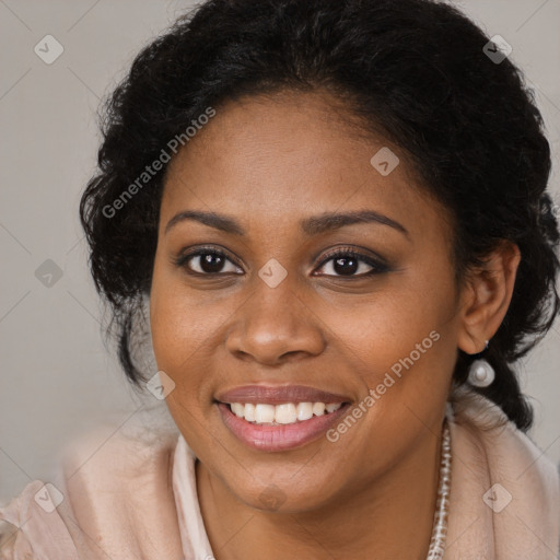 Joyful black young-adult female with long  brown hair and brown eyes