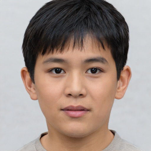 Neutral asian child male with short  black hair and brown eyes