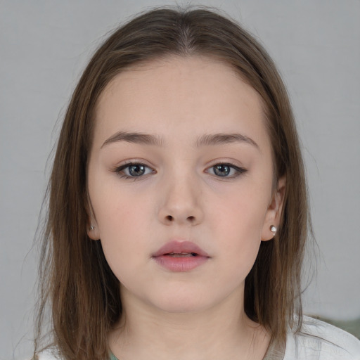 Neutral white child female with medium  brown hair and grey eyes