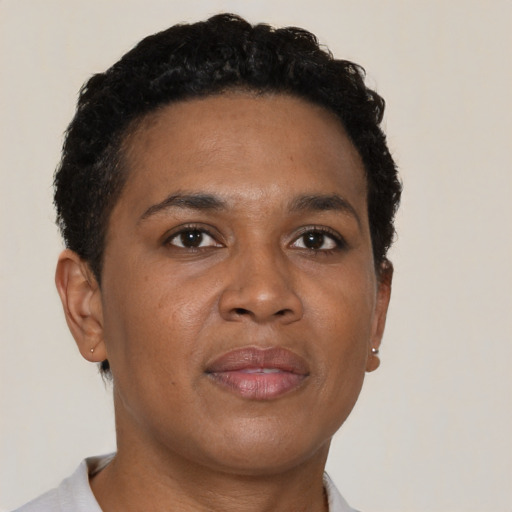 Neutral black adult female with short  brown hair and brown eyes