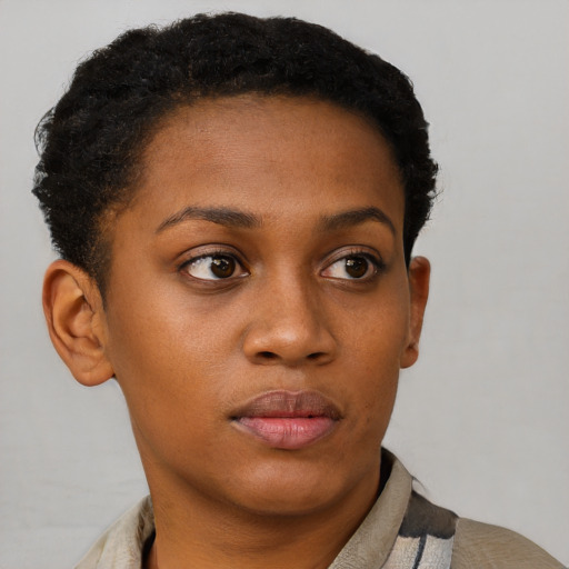 Neutral black young-adult female with short  brown hair and brown eyes