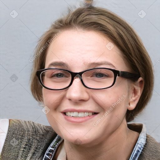 Joyful white young-adult female with short  brown hair and blue eyes