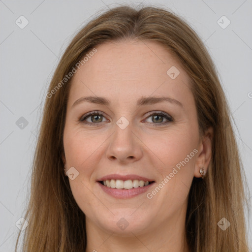 Joyful white young-adult female with long  brown hair and grey eyes