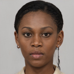 Neutral black young-adult female with short  brown hair and brown eyes