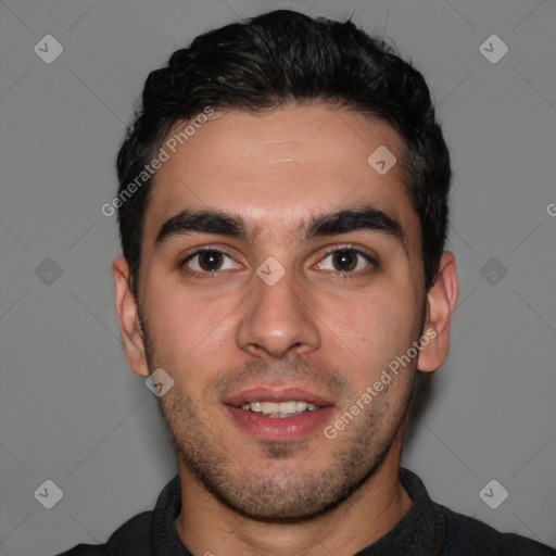 Joyful white young-adult male with short  black hair and brown eyes