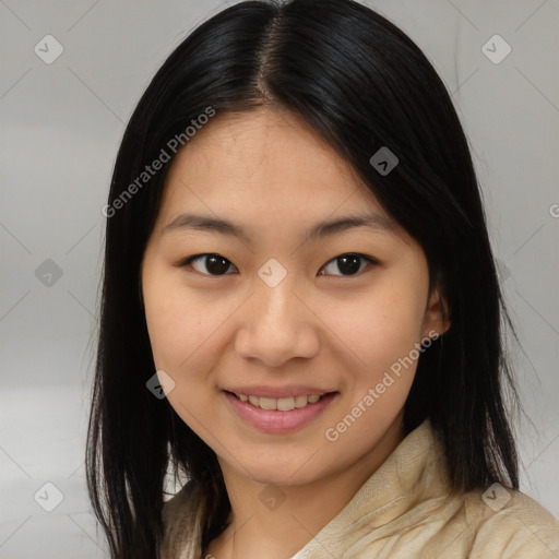 Joyful asian young-adult female with long  brown hair and brown eyes