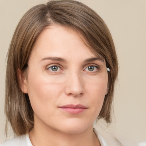 Neutral white young-adult female with medium  brown hair and grey eyes