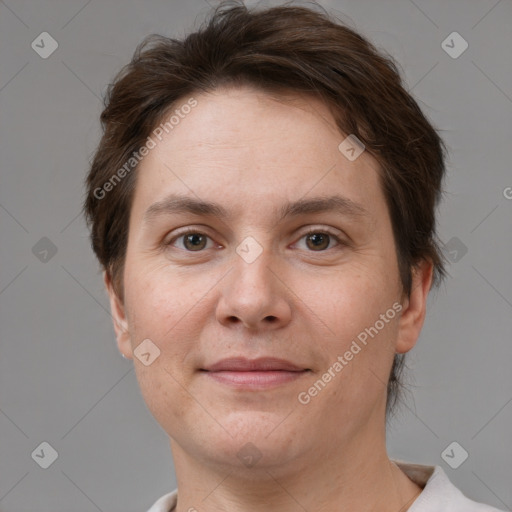 Joyful white adult female with short  brown hair and brown eyes