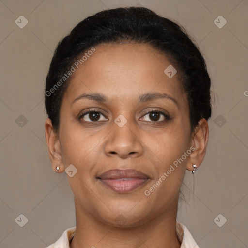 Joyful black young-adult female with short  brown hair and brown eyes