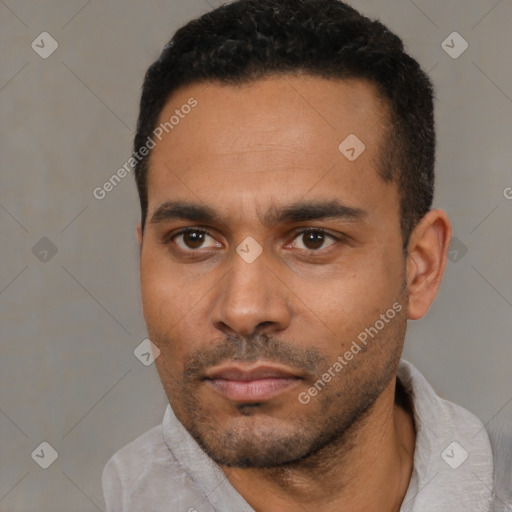 Neutral black young-adult male with short  black hair and brown eyes