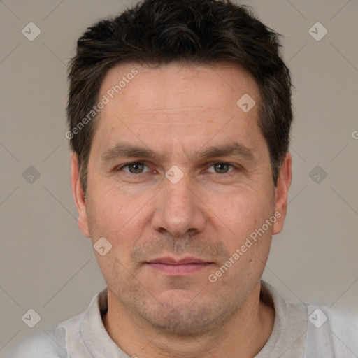 Neutral white adult male with short  brown hair and brown eyes