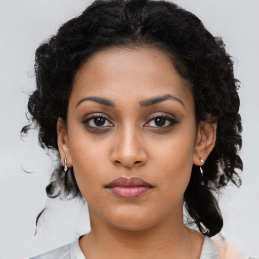 Neutral latino young-adult female with medium  black hair and brown eyes
