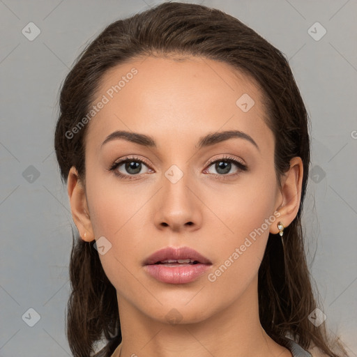 Neutral white young-adult female with medium  brown hair and brown eyes