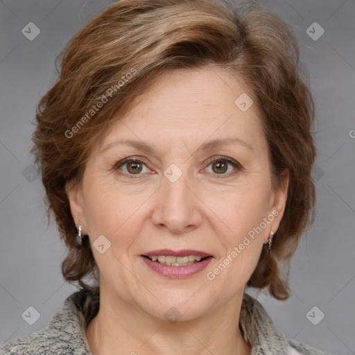 Joyful white adult female with medium  brown hair and grey eyes