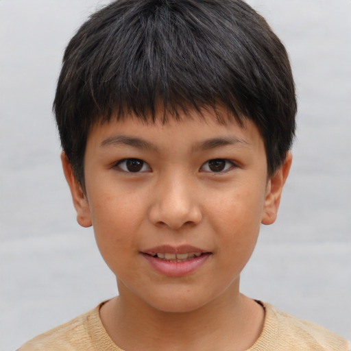 Joyful asian child female with short  brown hair and brown eyes