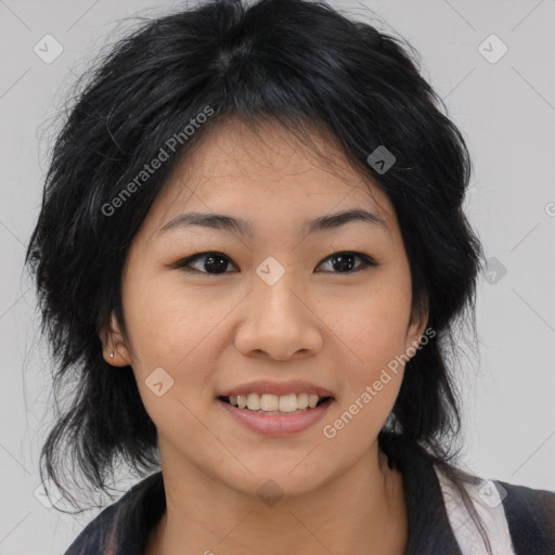 Joyful asian young-adult female with medium  black hair and brown eyes